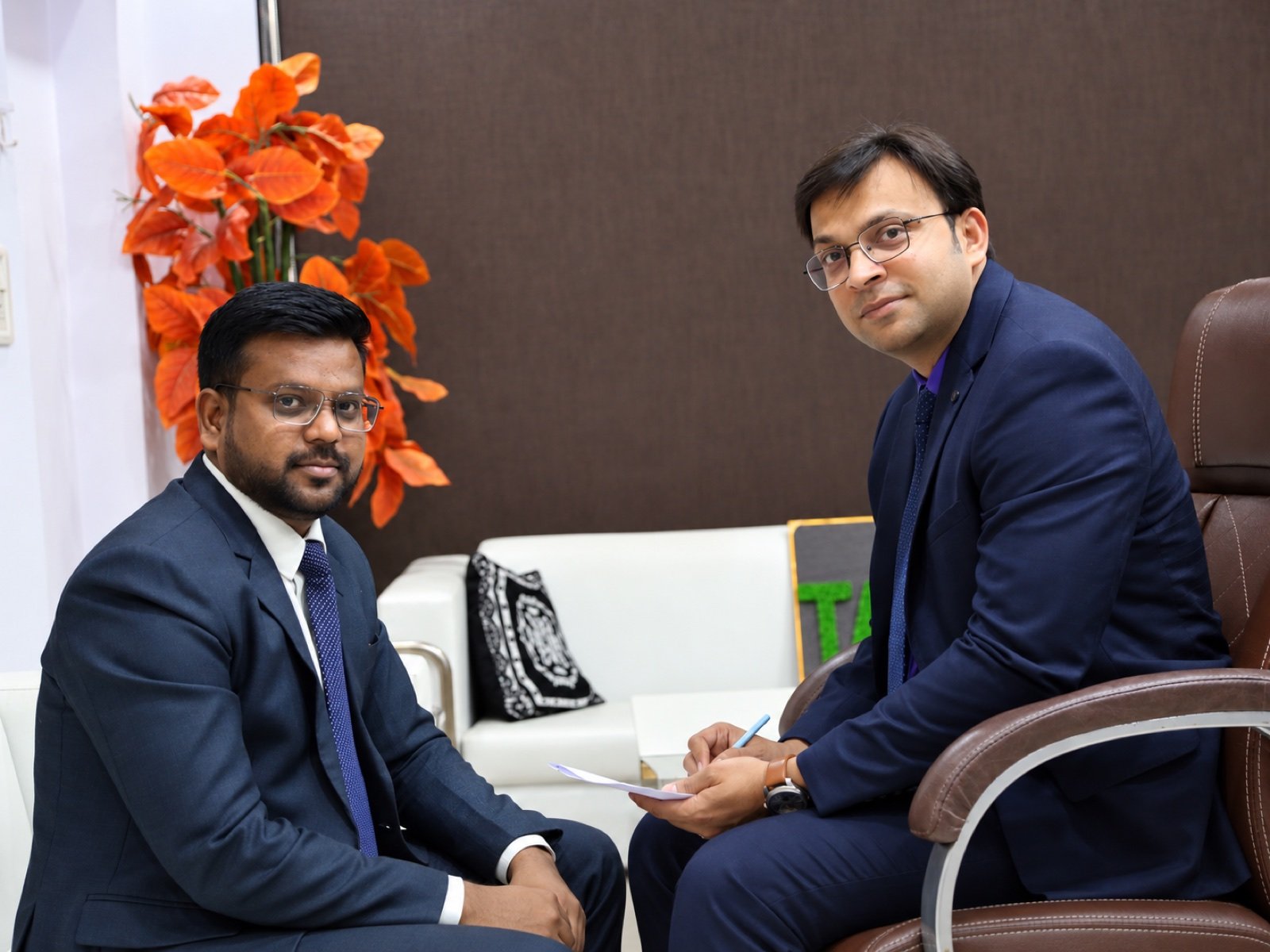 Arvind Kalot with Niranjan Mahawar at the Taxway office