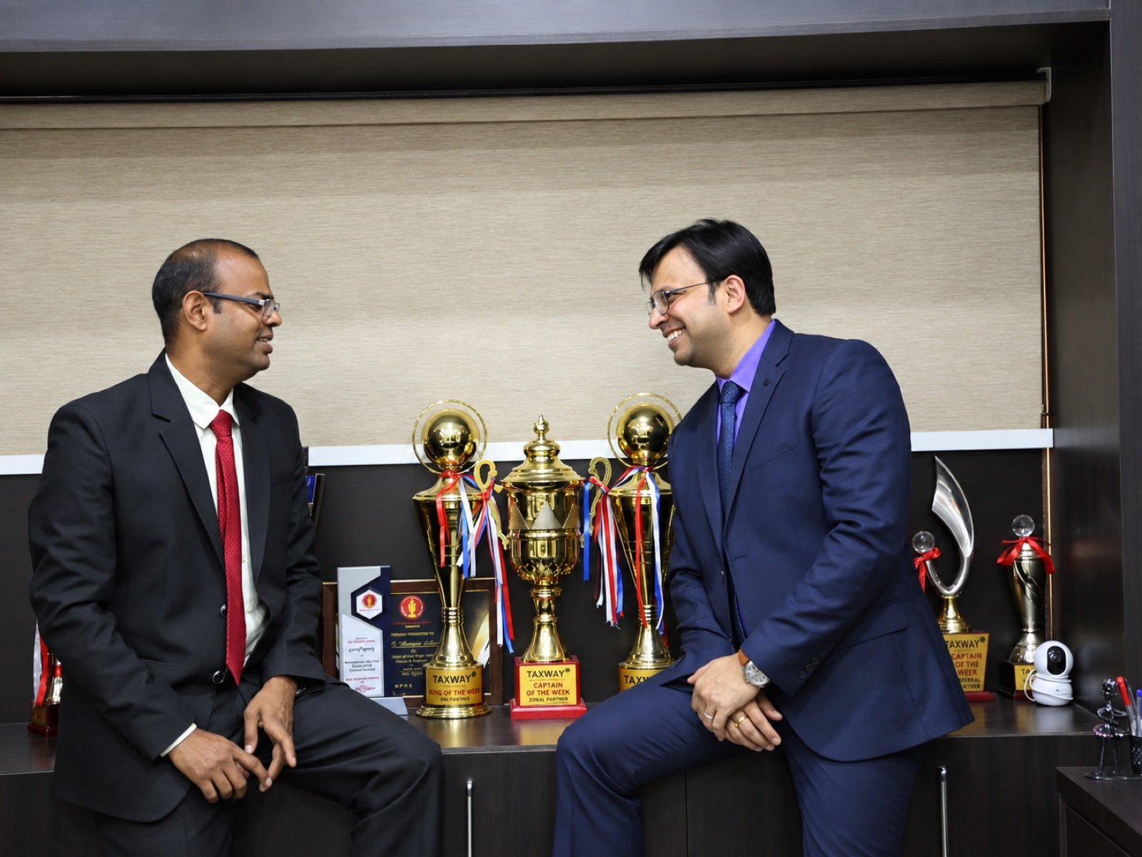 Girish Tak with Niranjan Mahawar at the Taxway office