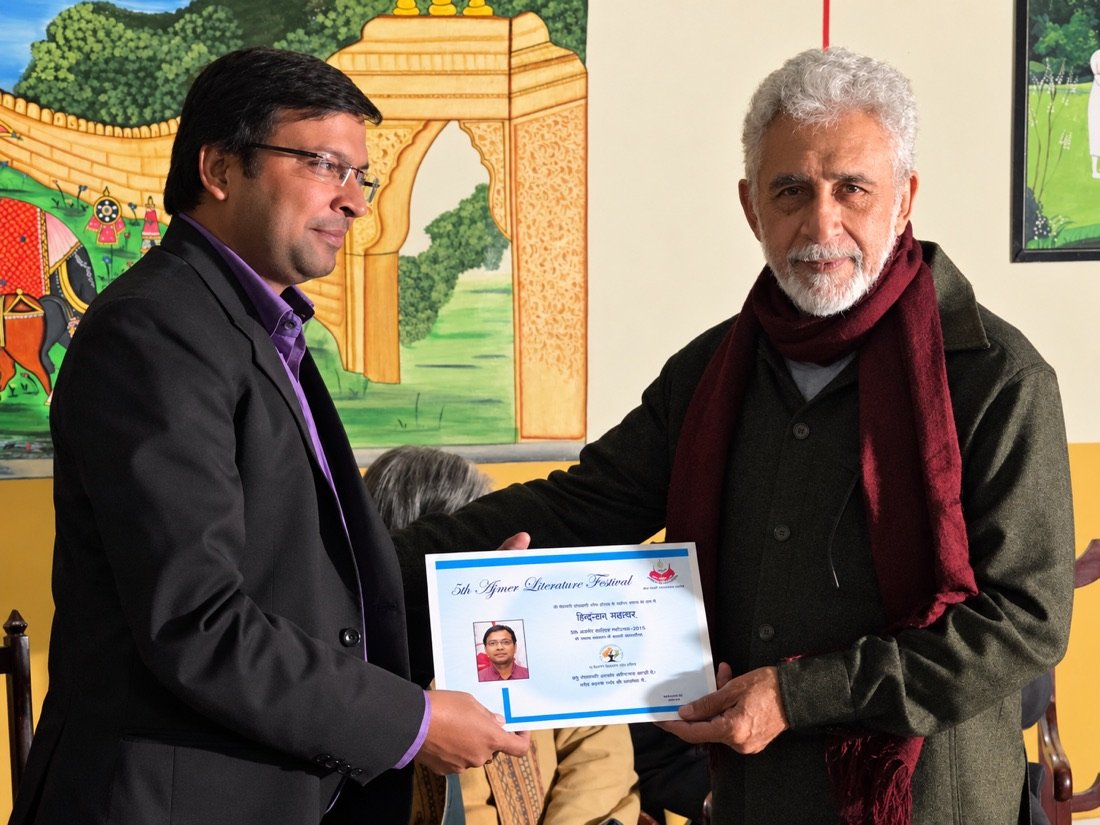Niranjan Mahawar receiving recognition at the Ajmer Literature Festival
